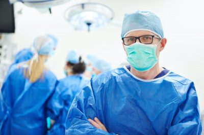 Experienced doctor in surgical uniform
